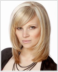 Med length blonde bob hairstyle with side swept bangs