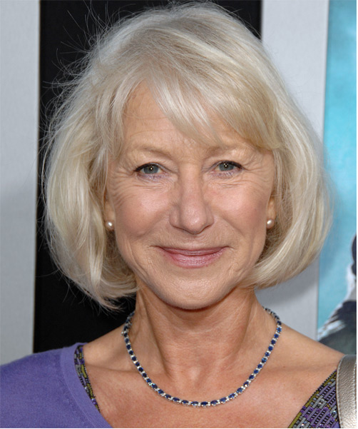Helen Mirren with soft side-swept bangs frame the top of the face