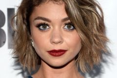Sarah Hyland medium hairstyle with long layers through the back and sides.